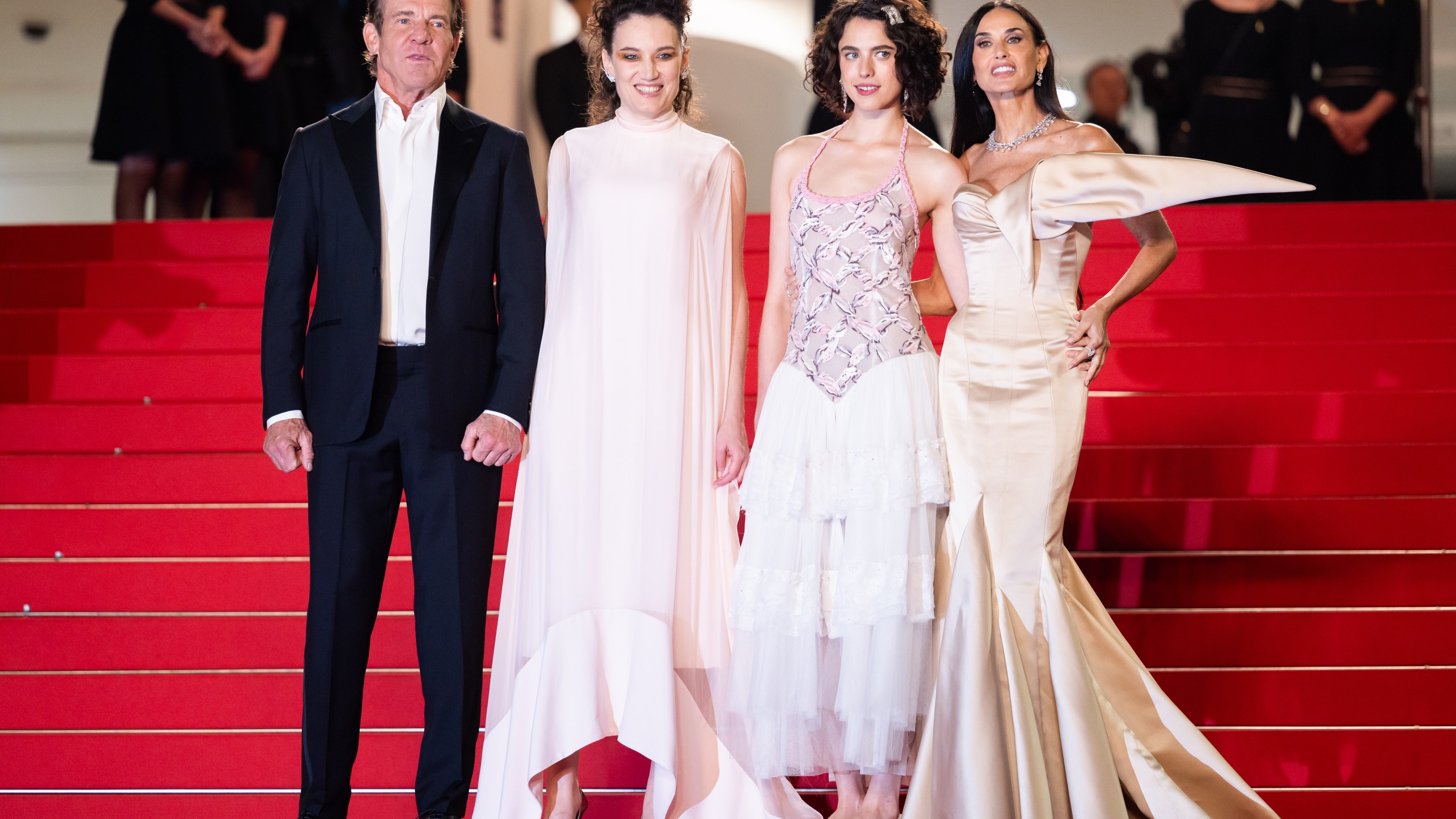 CANNES, FRANCE - MAY 19: (L-R) Dennis Quaid, Coralie Fargeat, Margaret Qualley and Demi Moore attend the "The Substance" Red Carpet at the 77th annual Cannes Film Festival at Palais des Festivals on May 19, 2024 in Cannes, France. (Photo by Victor Boyko/WireImage )