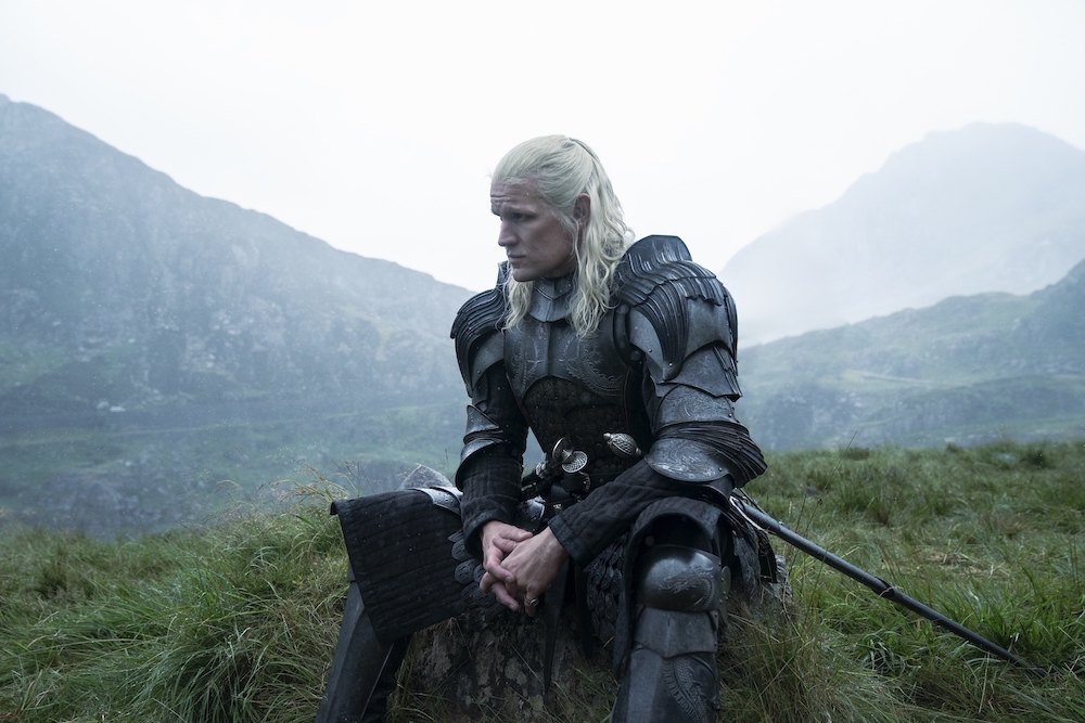 'House of the Dragon' Season 2 stars Matt Smith as Daemon, shown here sitting on a stump wearing a suit of armor